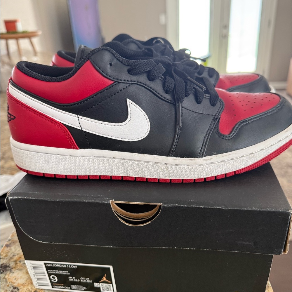 Air Jordan 1 Low Black/Red Sneakers with White Swoosh - Picture 3 of 6